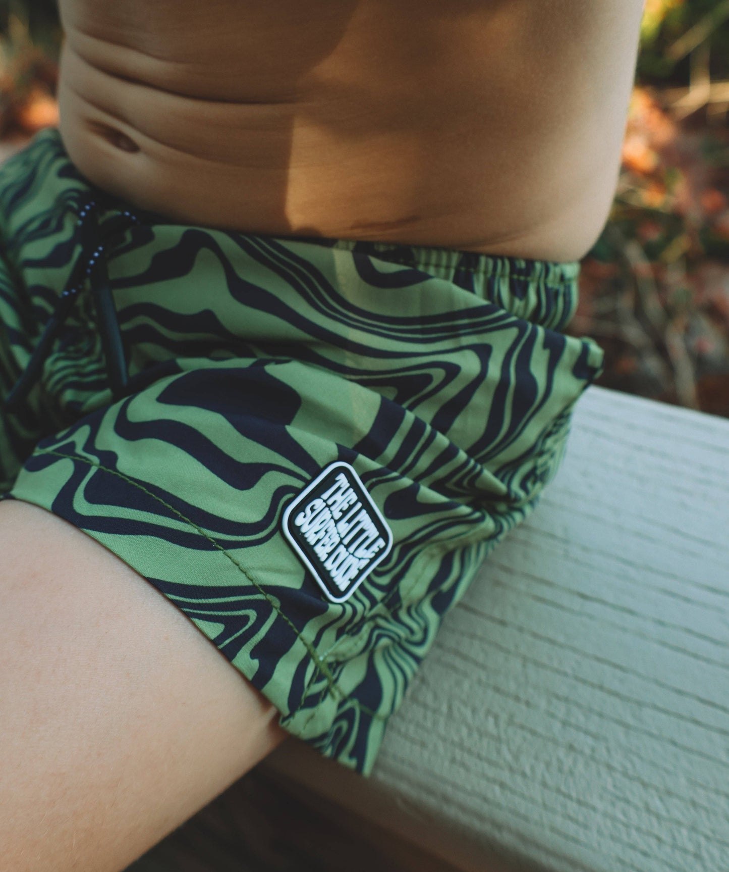 Green and Black Swirl Swim Trunks